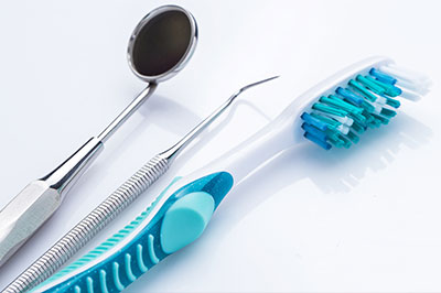 Everything Smiles | Extractions, Implant Restorations and Invisalign reg 